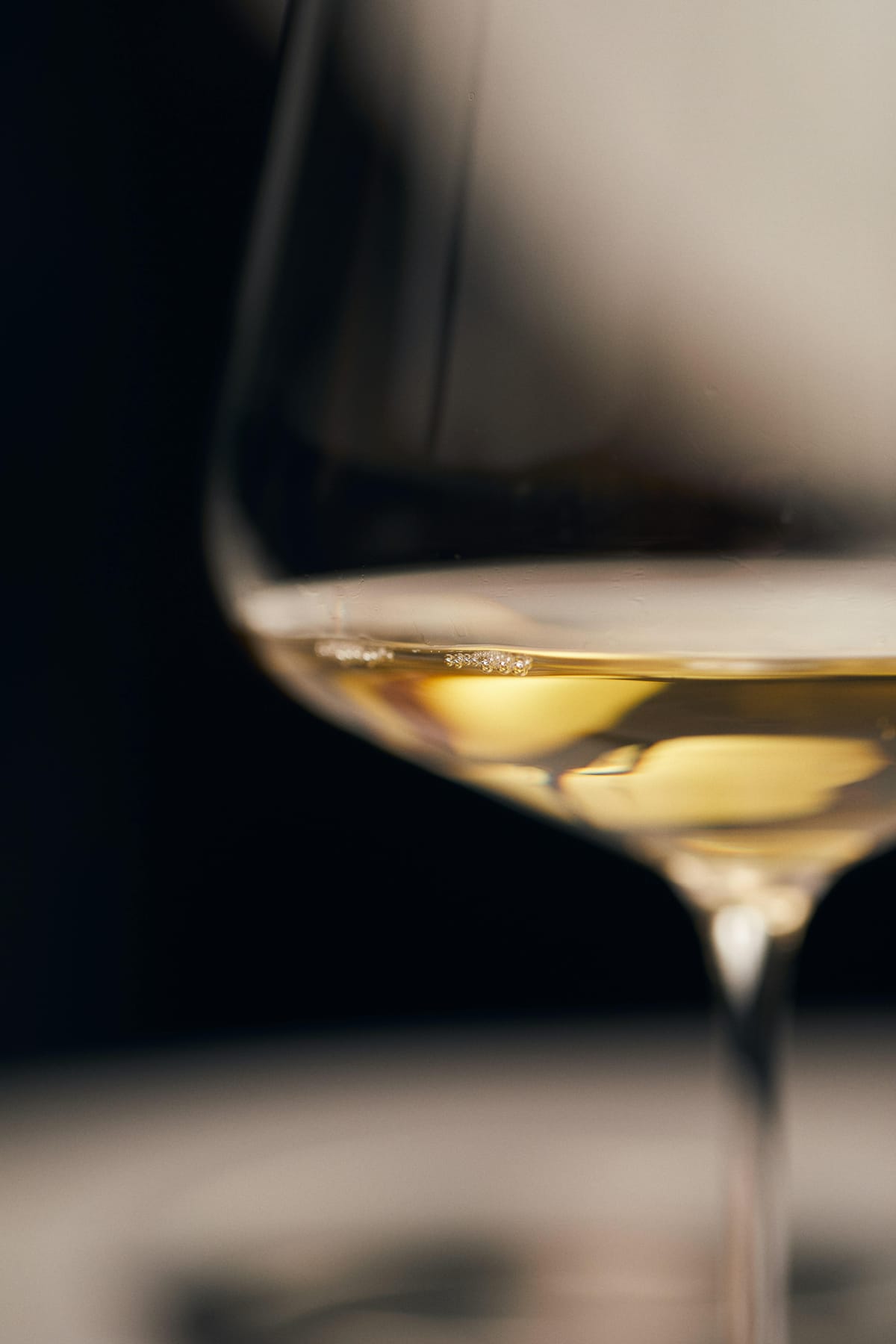 Elegant photo of a glass of white wine